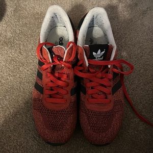 Red and black adidas shoe